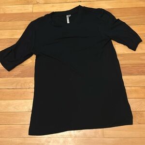 This is a extra small black elbow length sleeve banana republic T-shirt.